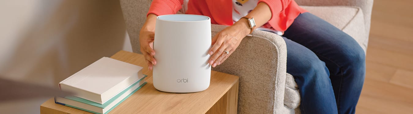 Netgear Orbi WiFi and woman