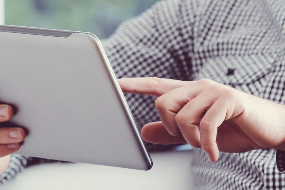 man using tablet