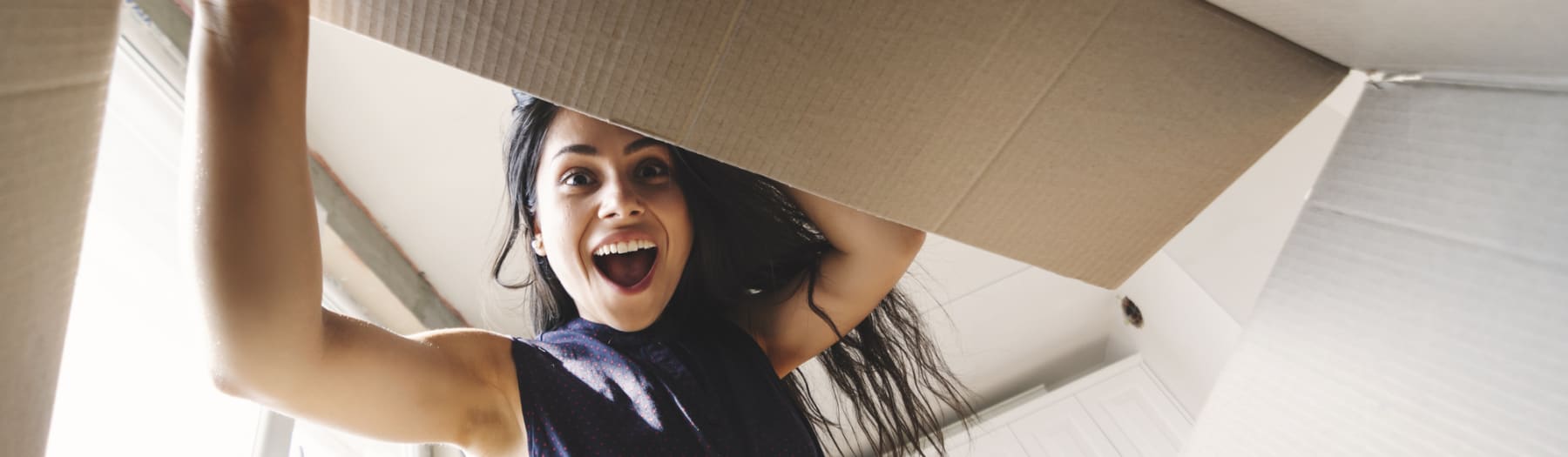 Woman looking in box