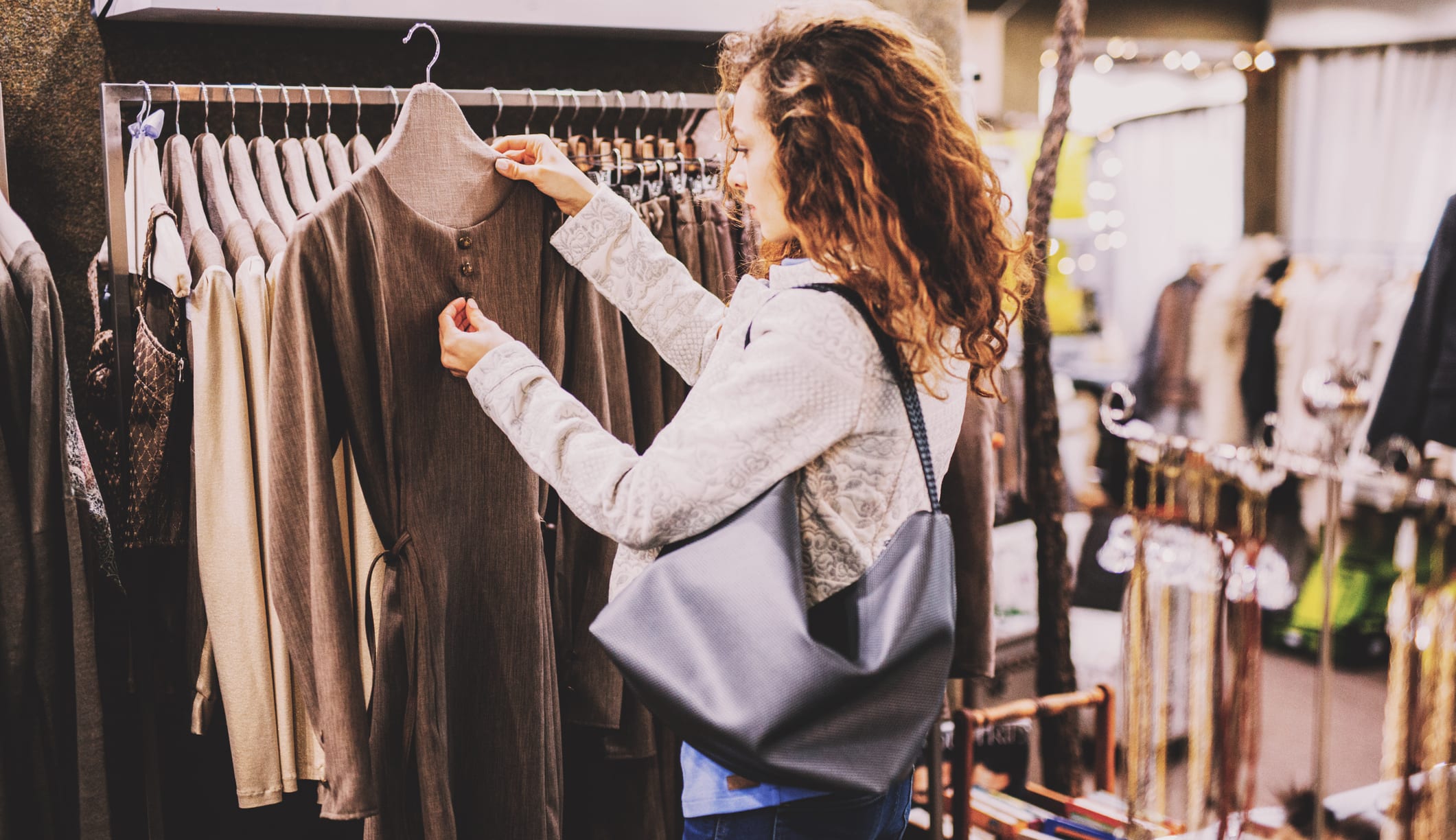 woman checks price tag