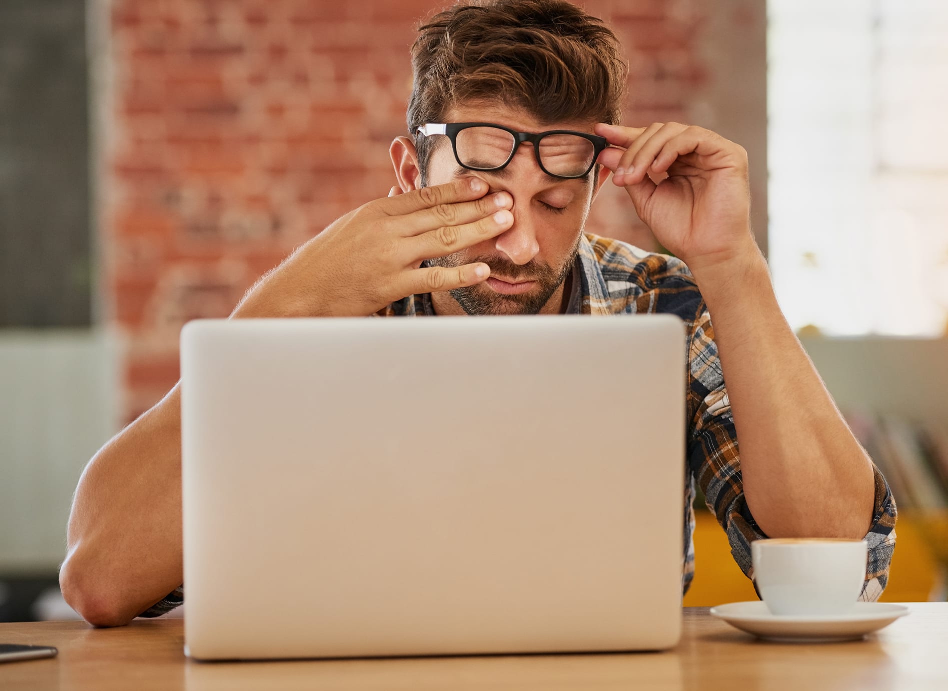 Stressed Man Looking at Computer