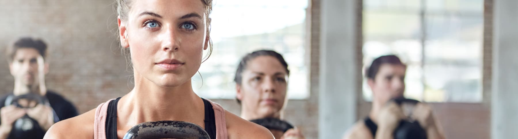 exercising with kettlebells