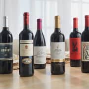Macy's Wine Cellar Top Wine Special: 6 + 2 Bottles of Wine w/ 2 Glasses for $30 + $9.99 s&h