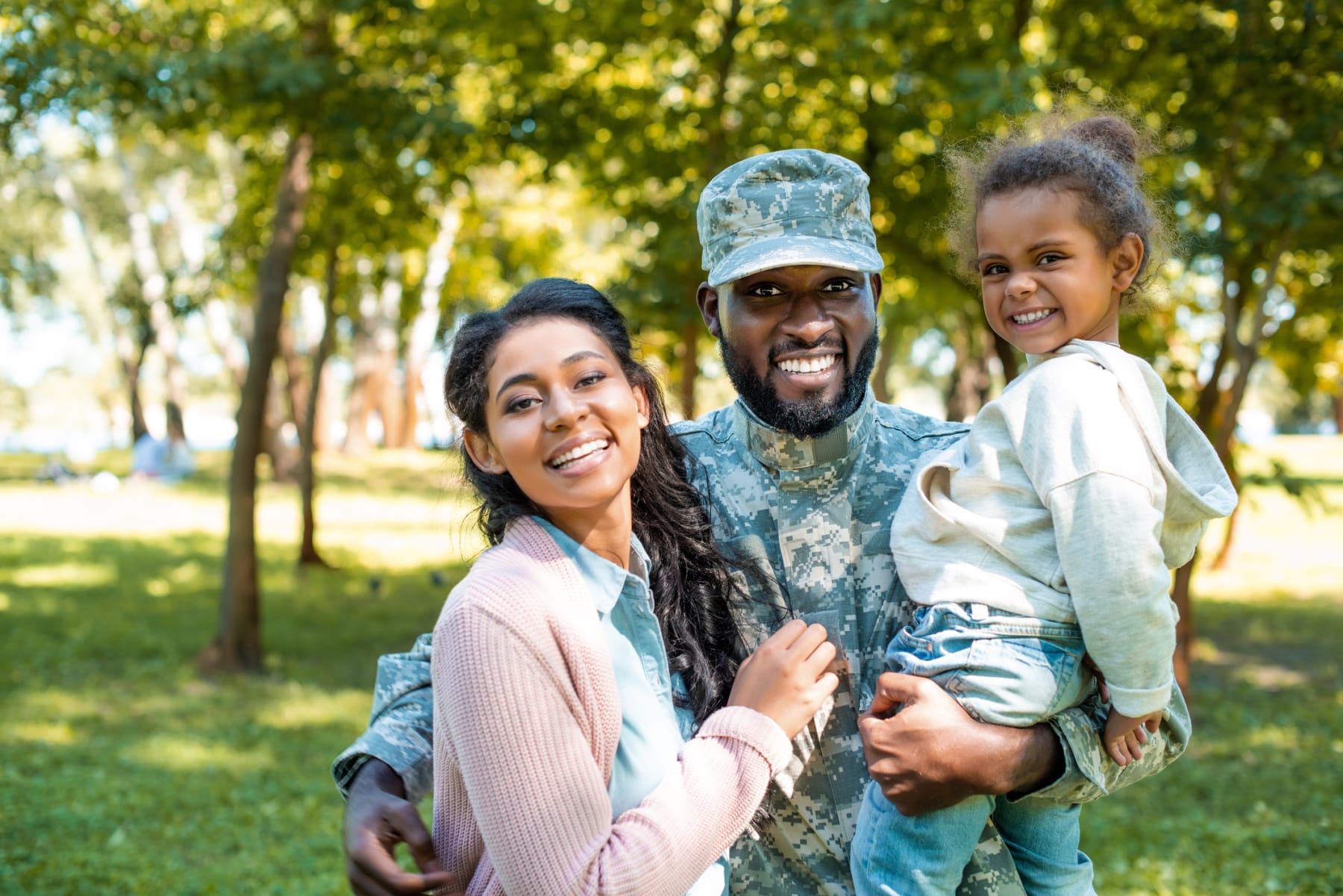 happy military family in park