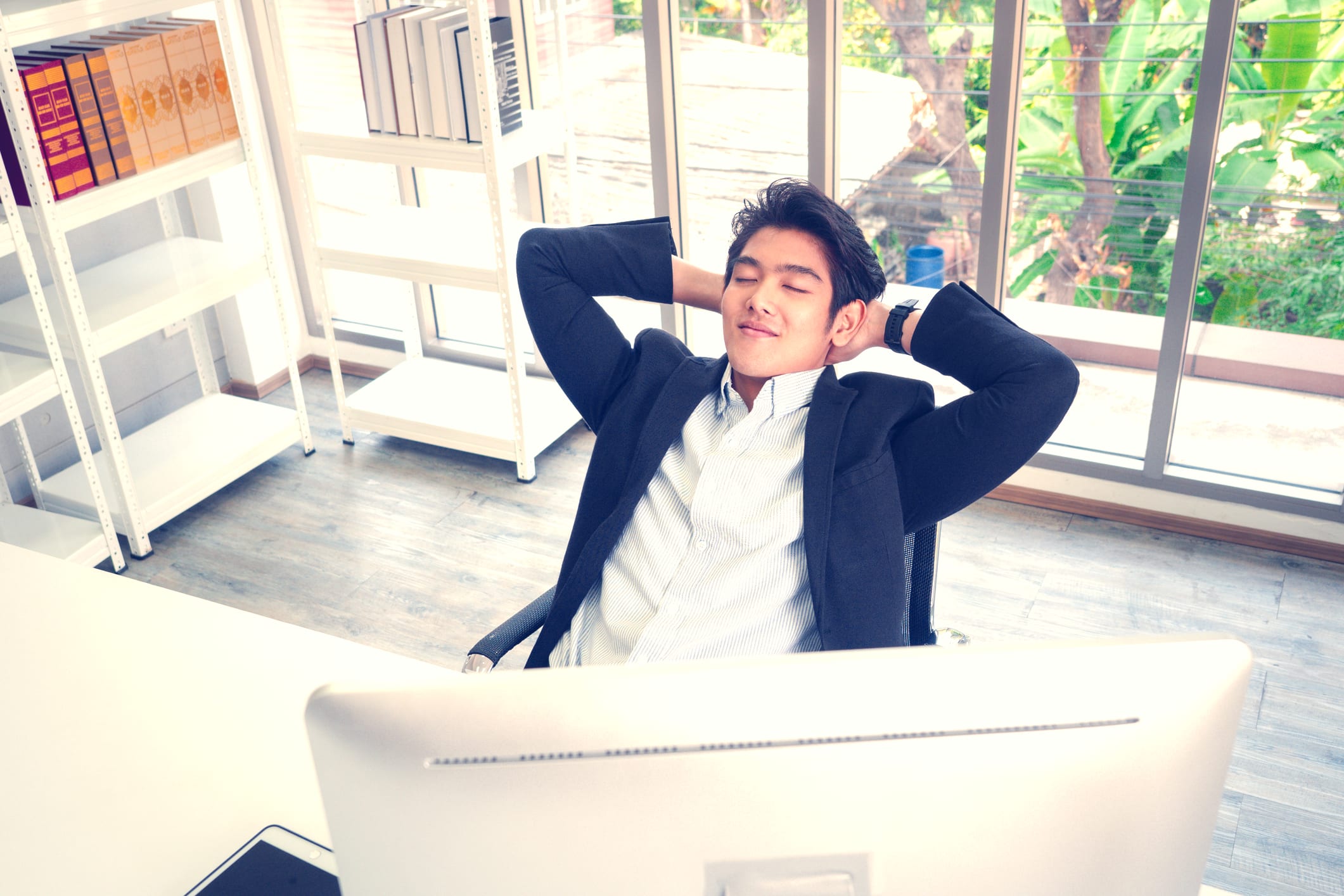 relaxing in office chair