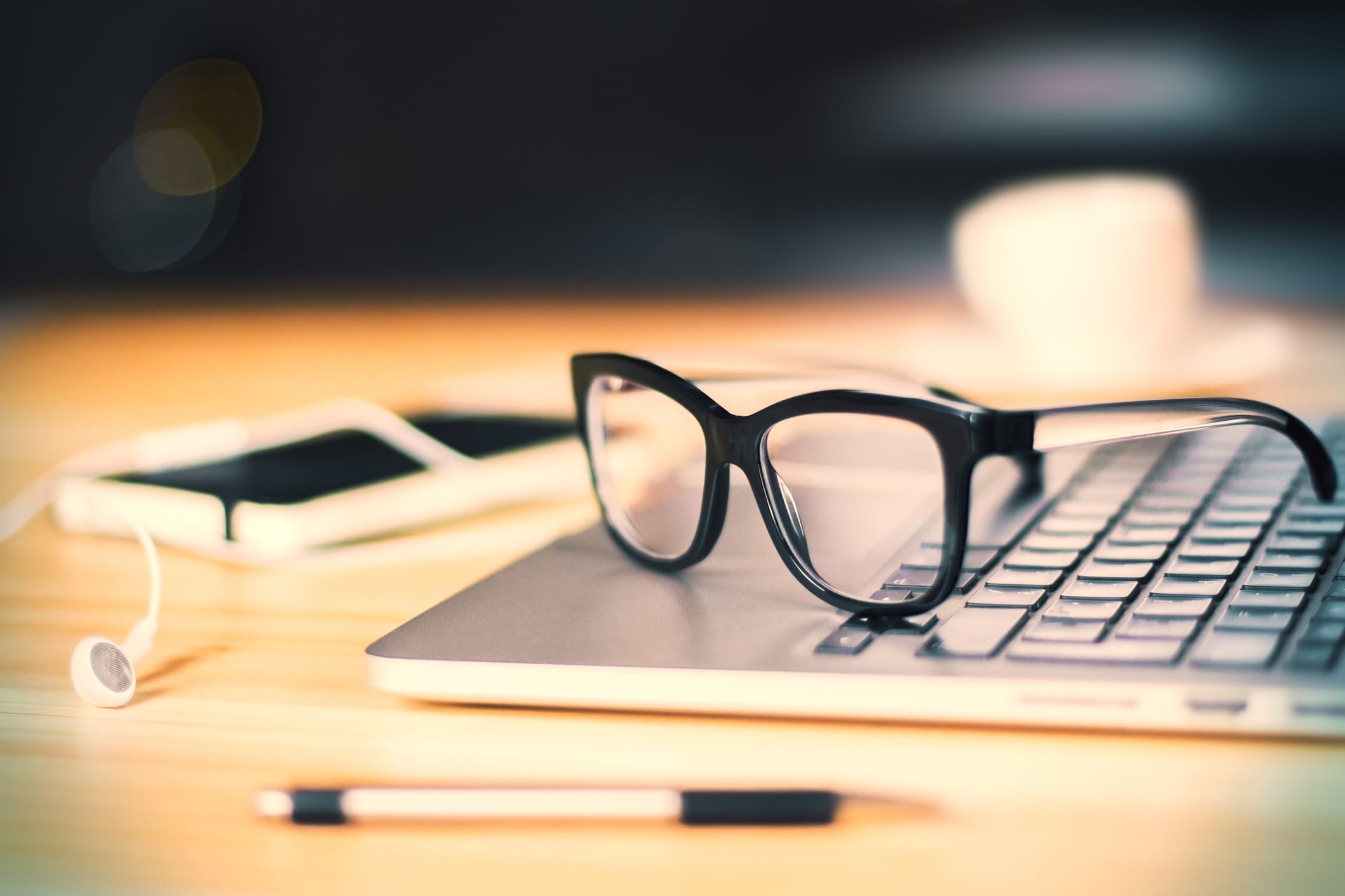 Eyeglasses on laptop