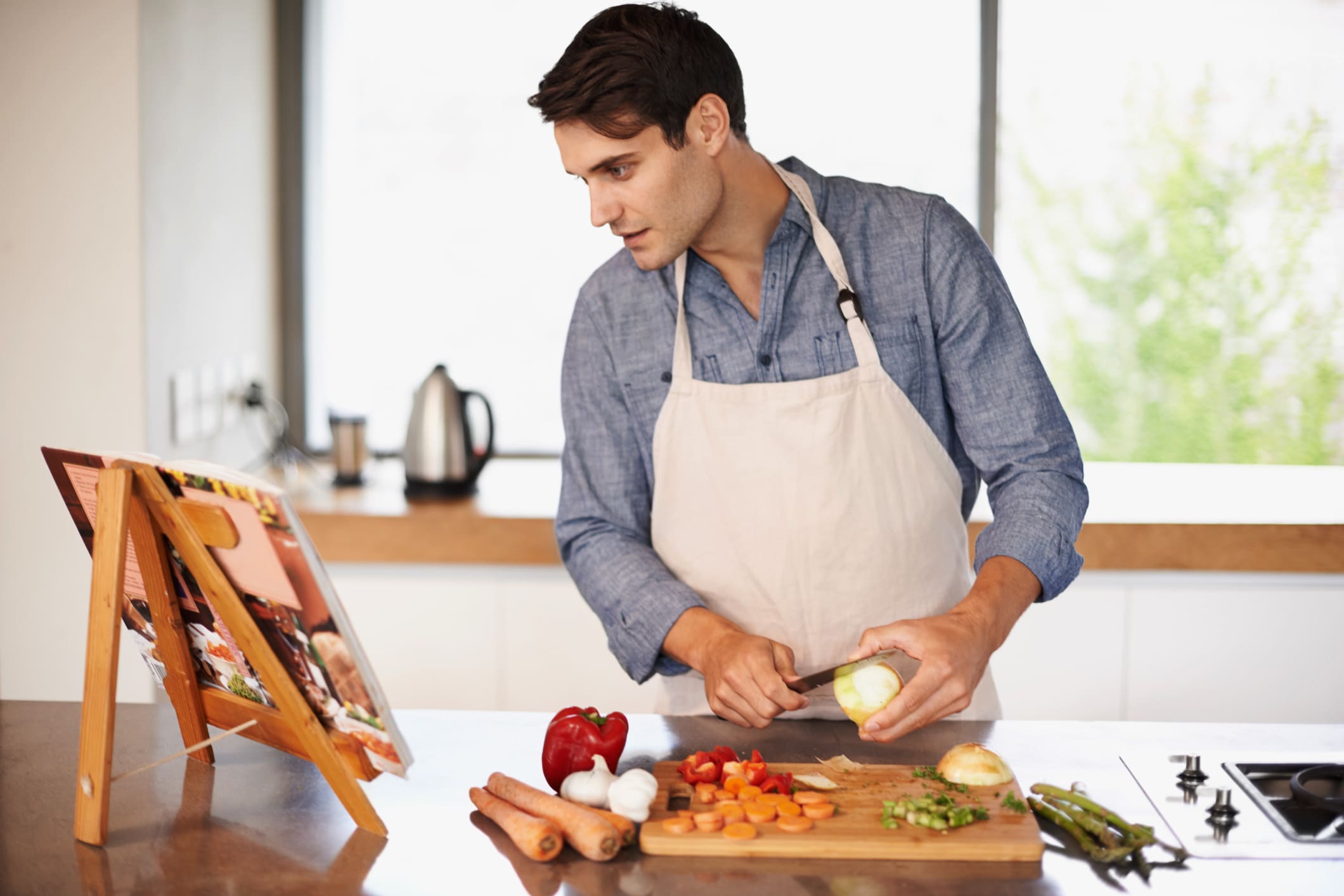 man preparing vegetables