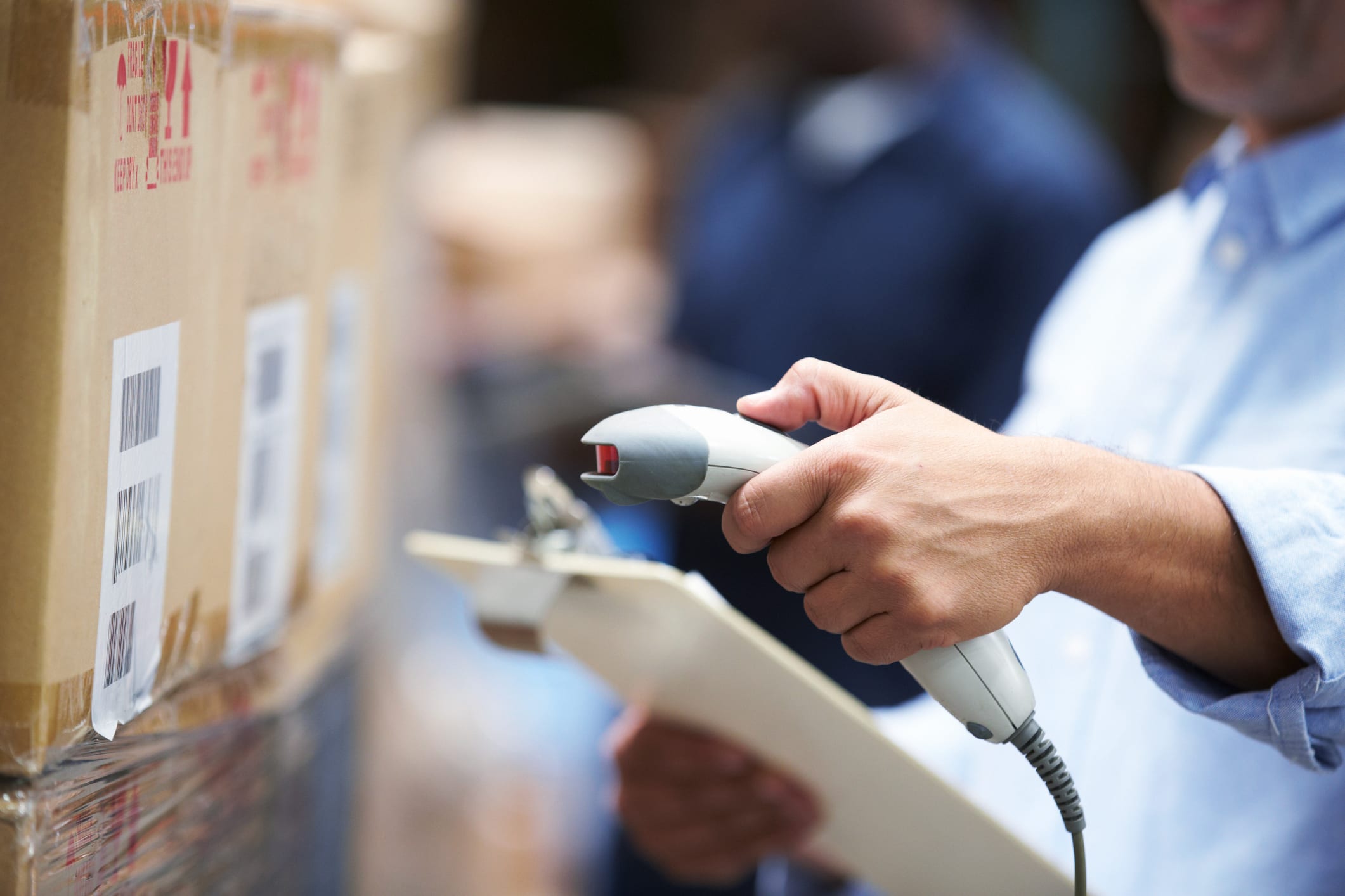 man scans package