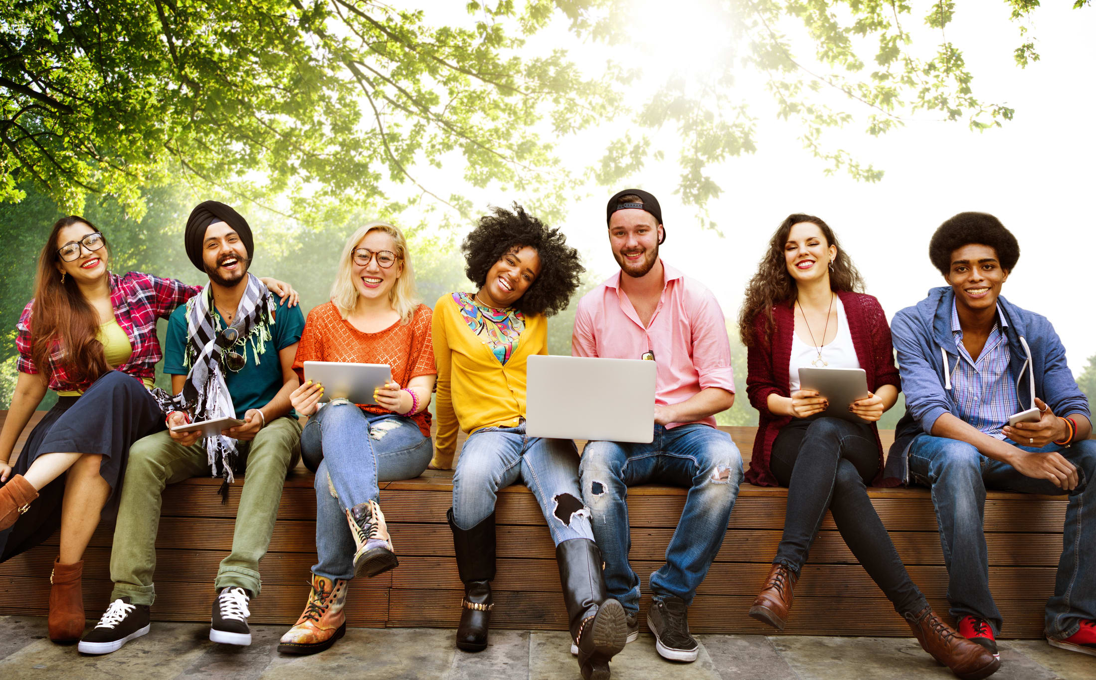 students on a wall