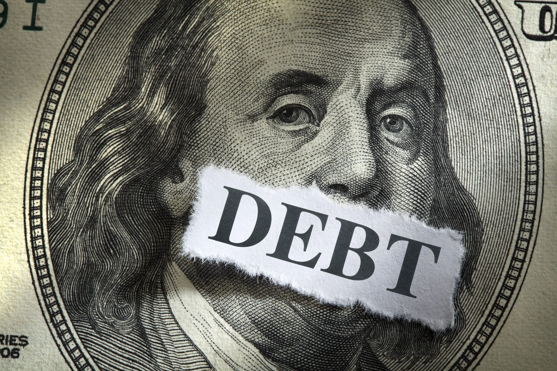 money with debt sign