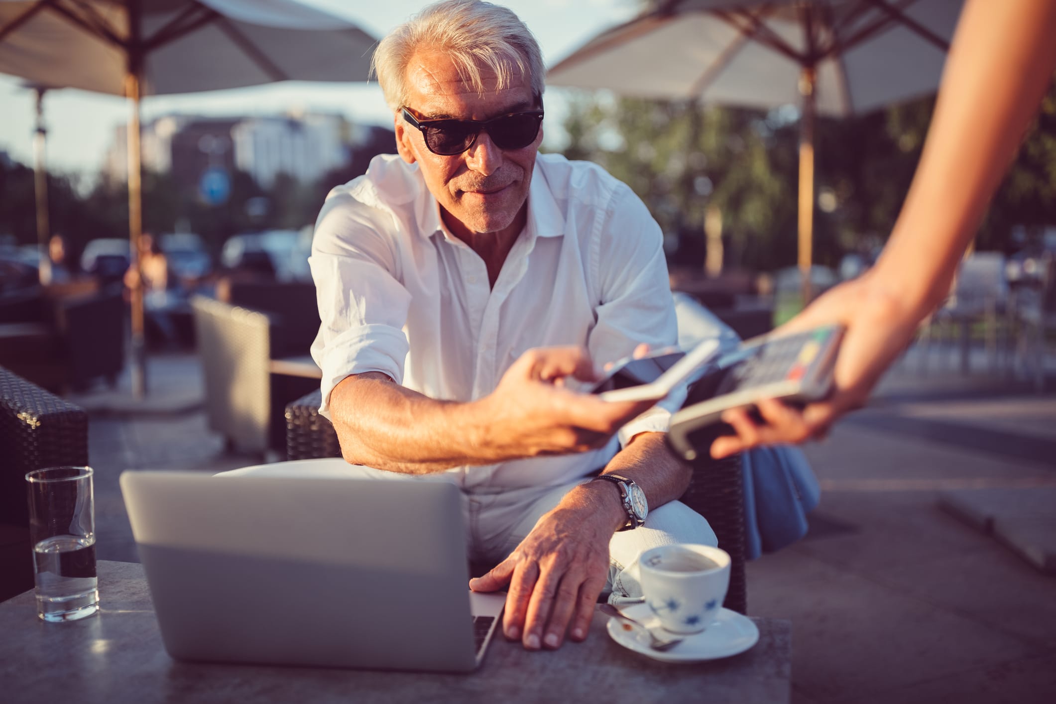 Older Man Making a Mobile Payment