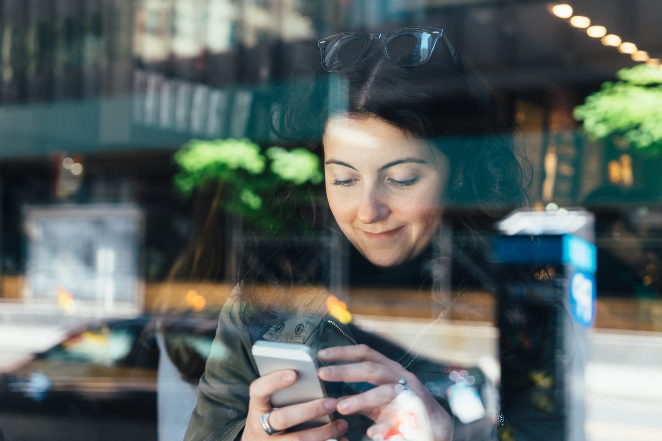 woman using rented smartphone