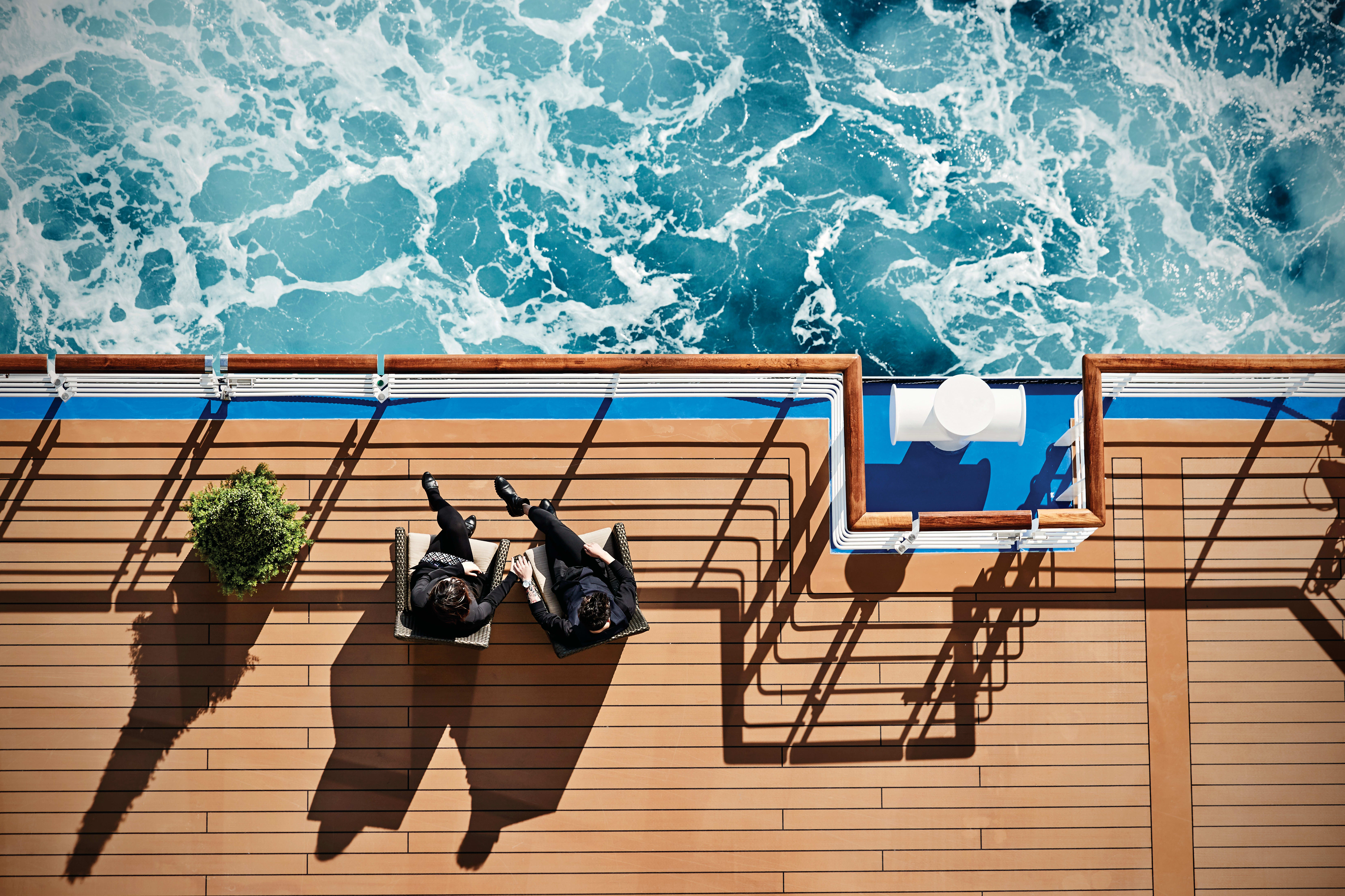couple with deck chairs