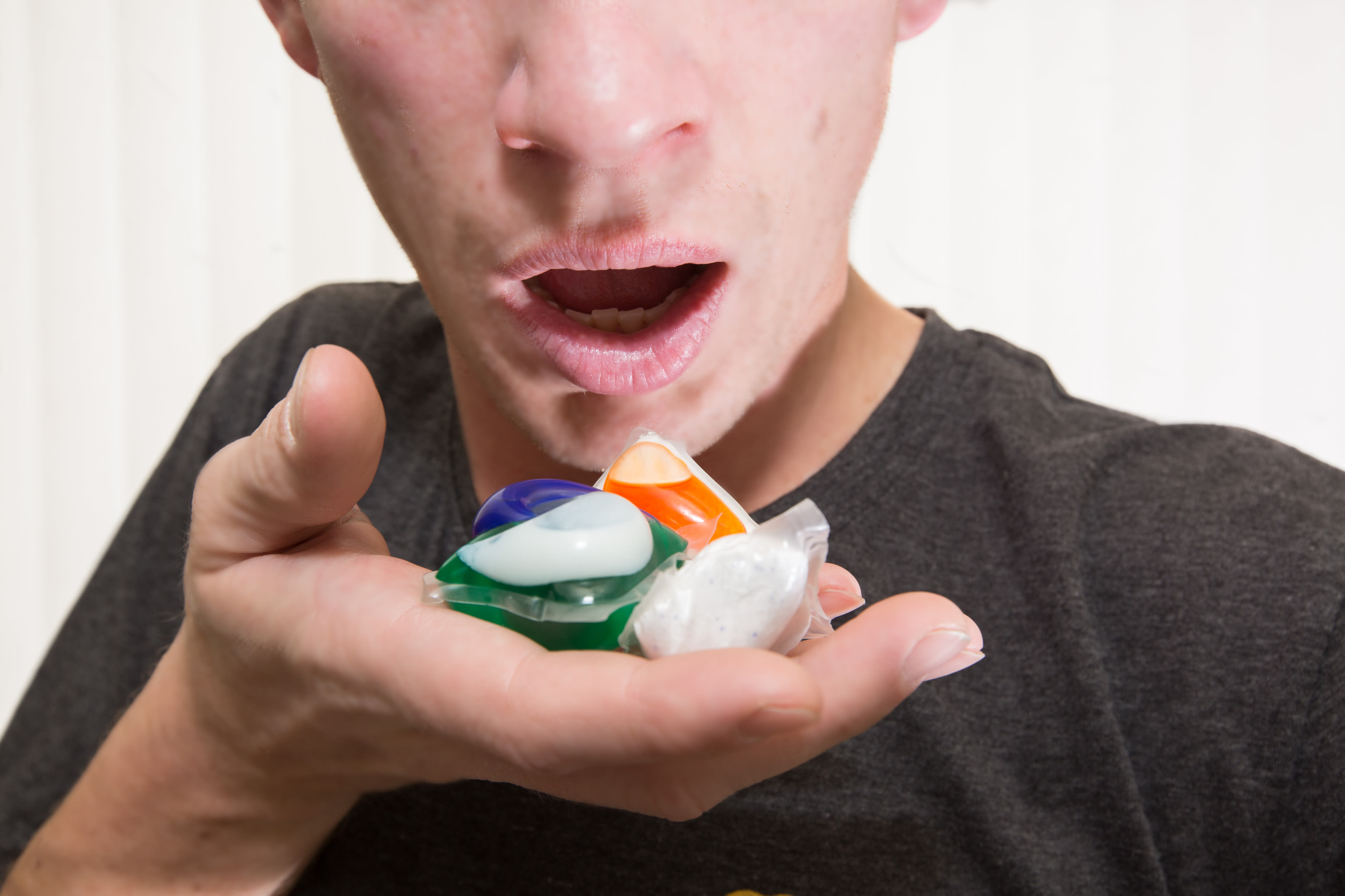 Man eating Tide Pods