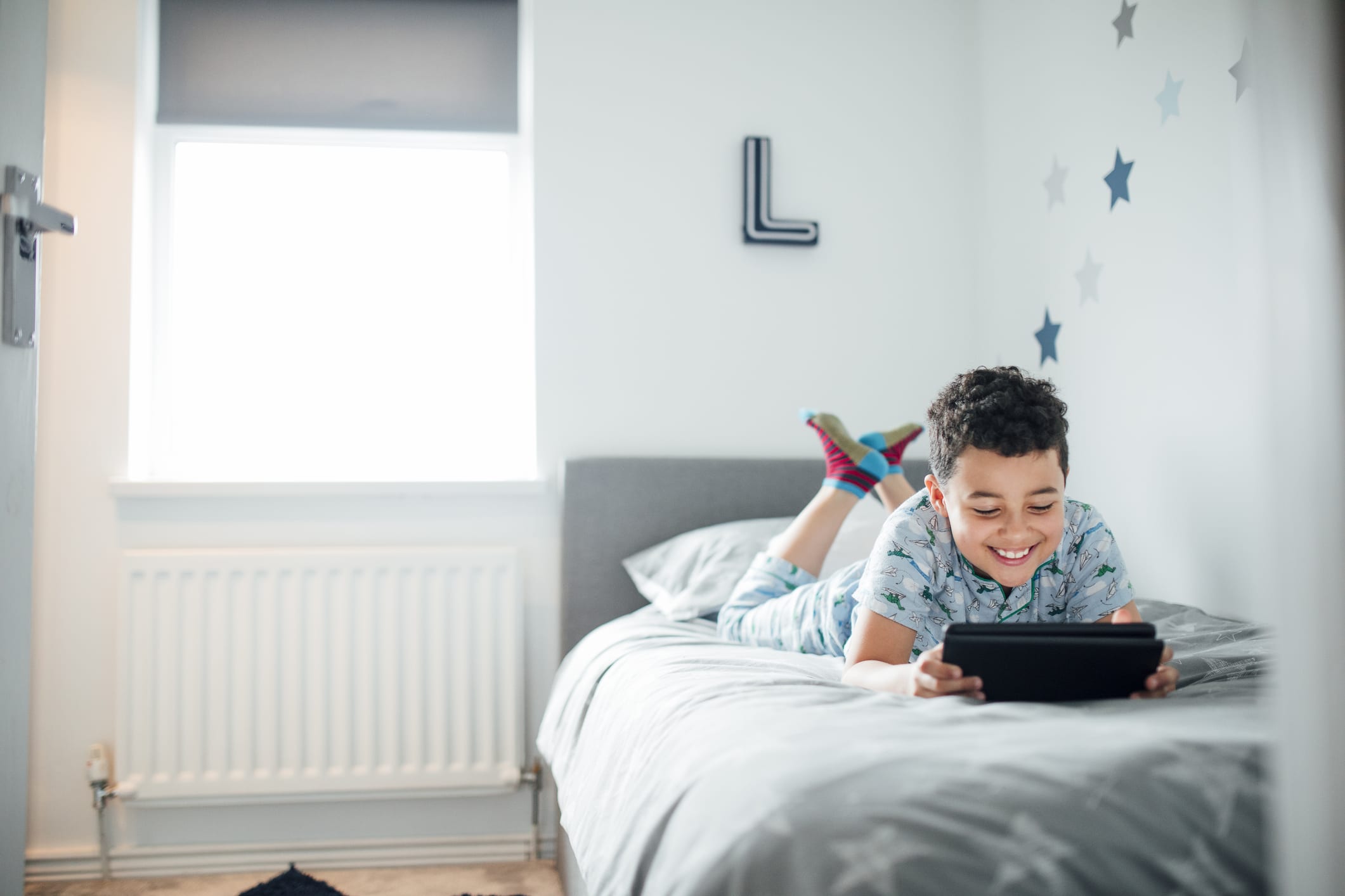 kid watching tablet