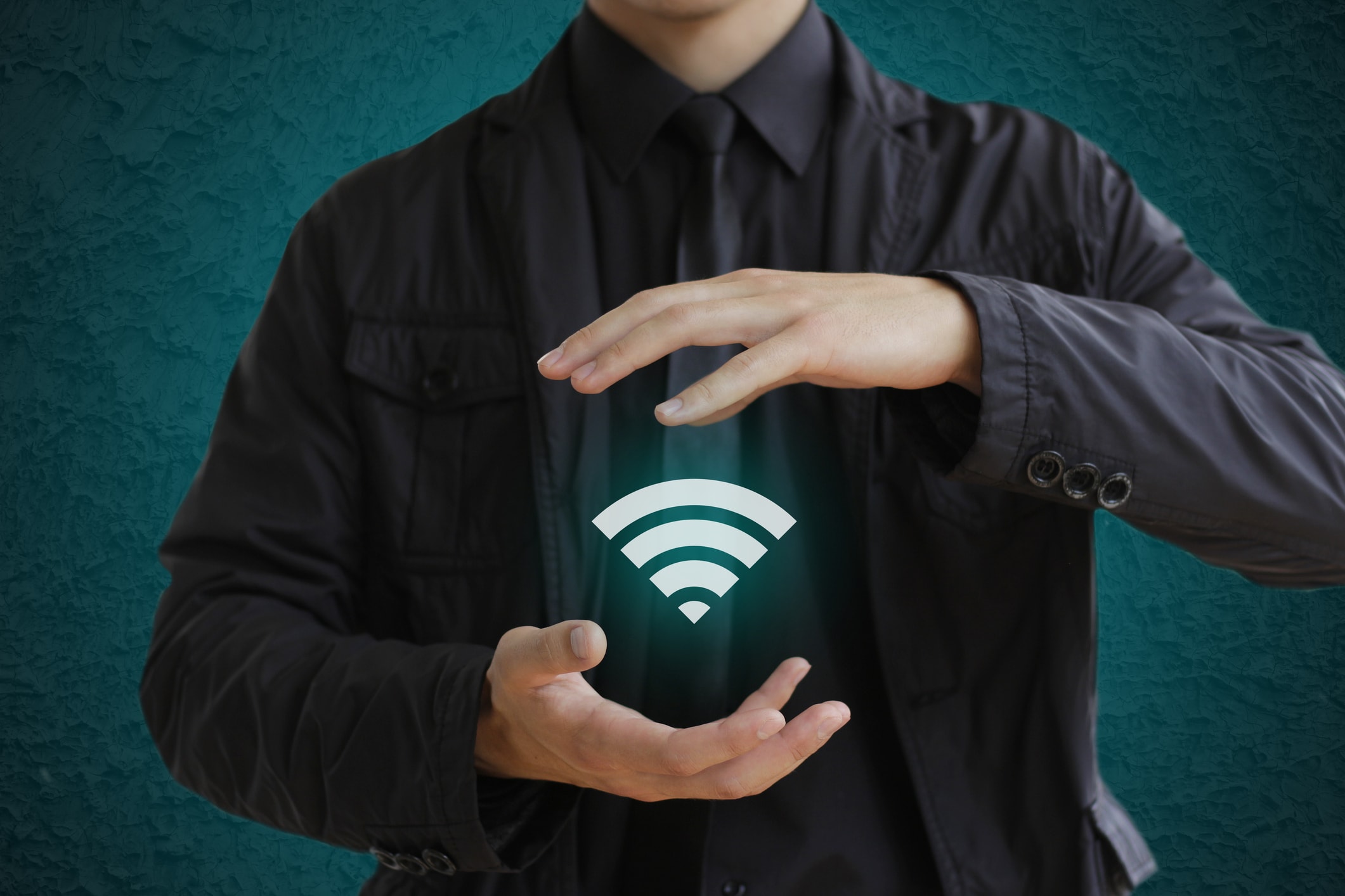 Man Holding a Wifi Icon