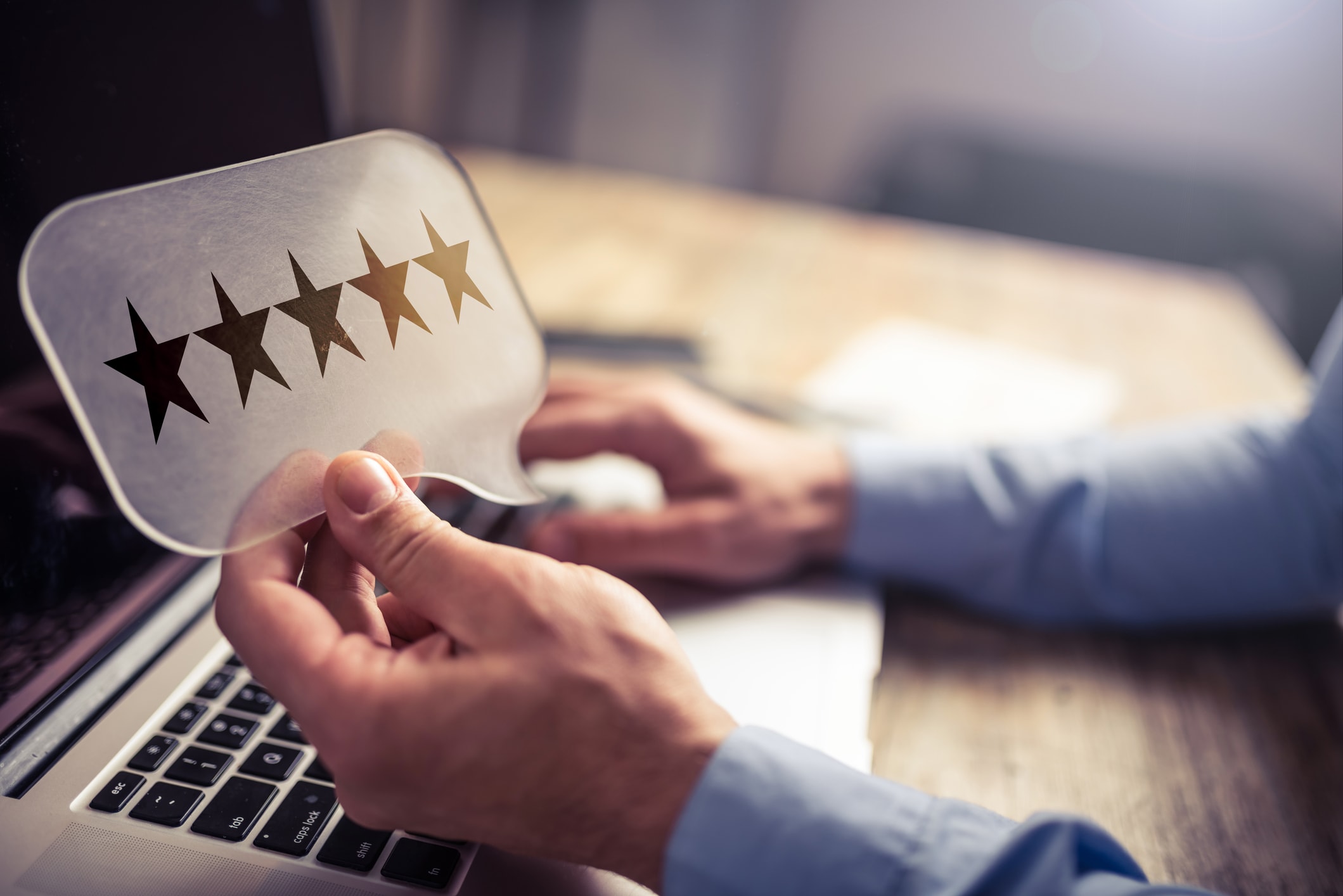 rating bubble and laptop