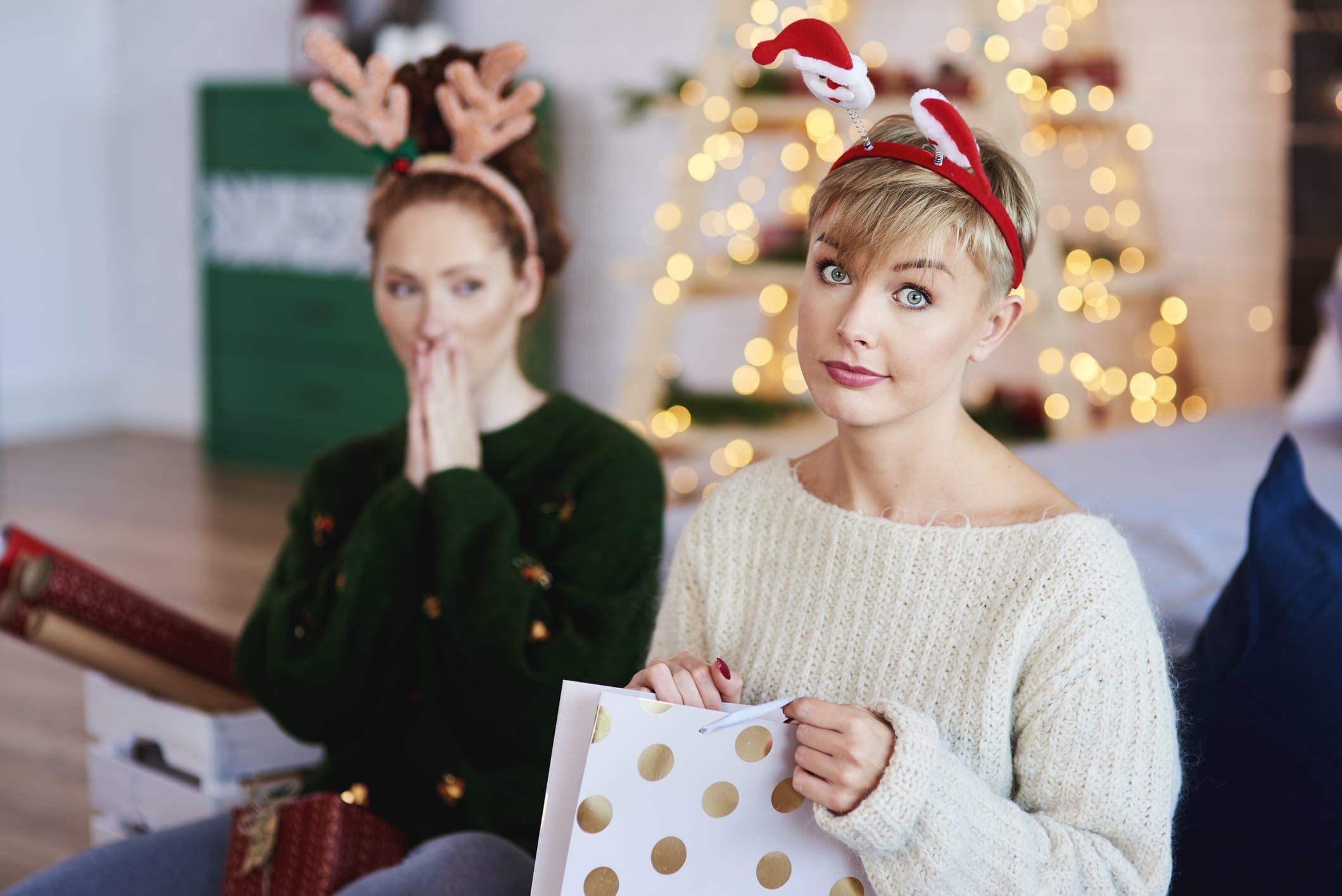 woman opening gift