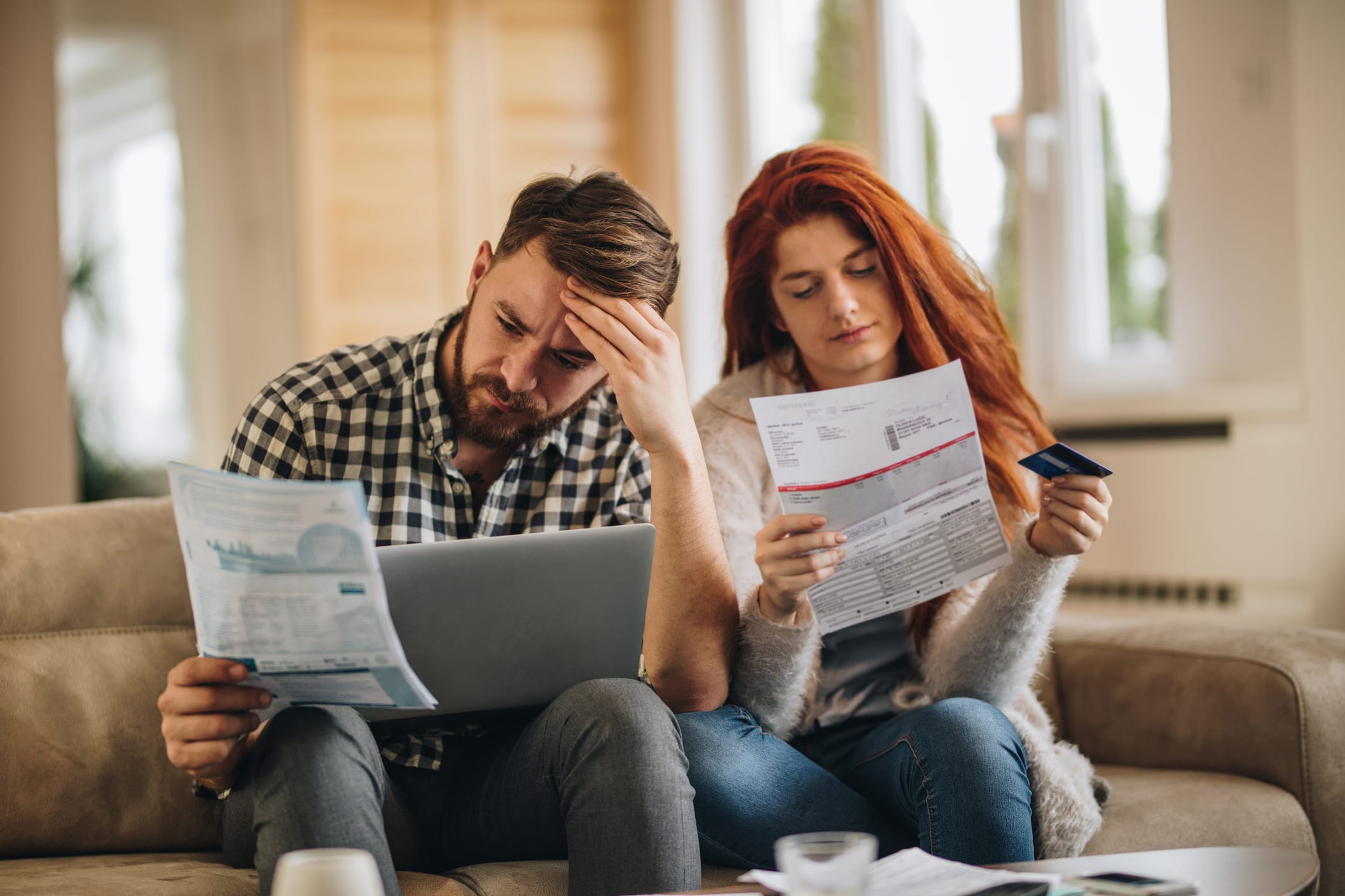 couple looking over bills