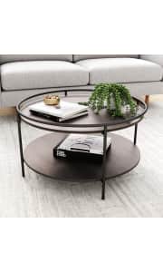 Nathan James Paloma Round Coffee Table. It's $110 off and the lowest price we could find.