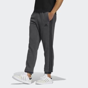 adidas Men's Essentials Fleece Tapered Cuff 3-Stripes Pants for $14