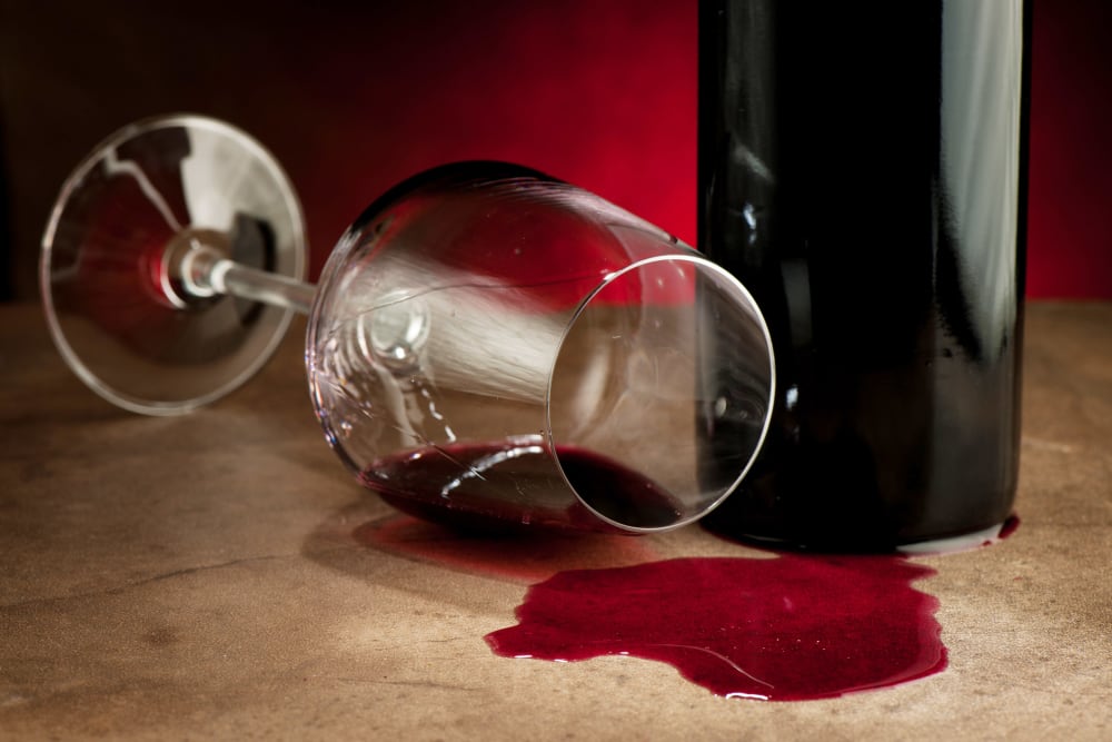 what does it mean when you spill a glass of wine