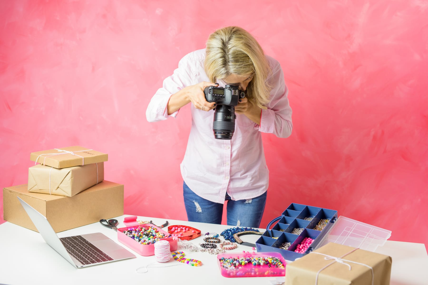Woman Taking Photos of Products for Online Store