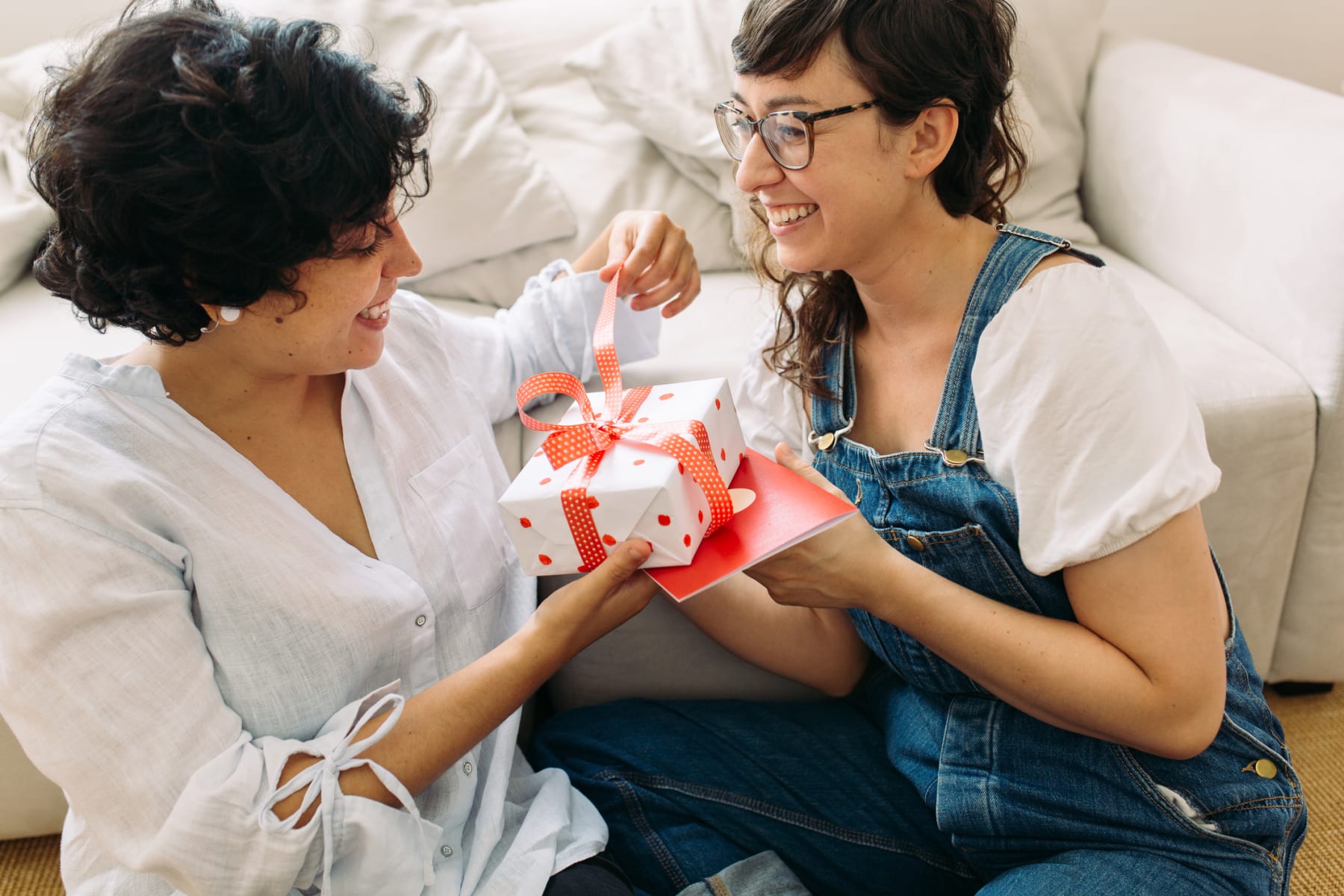 woman opening Valentine's gift