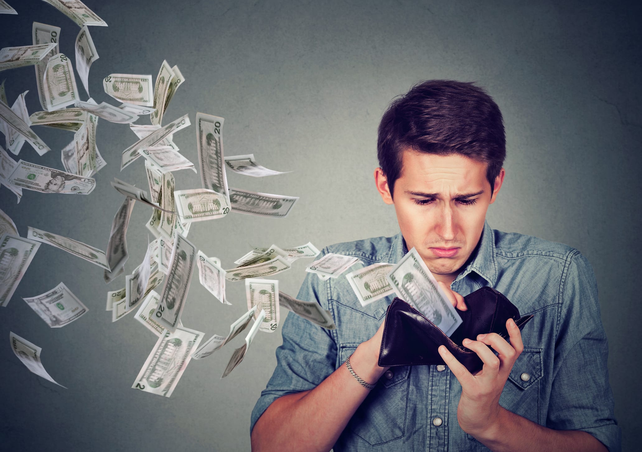 money flying from wallet