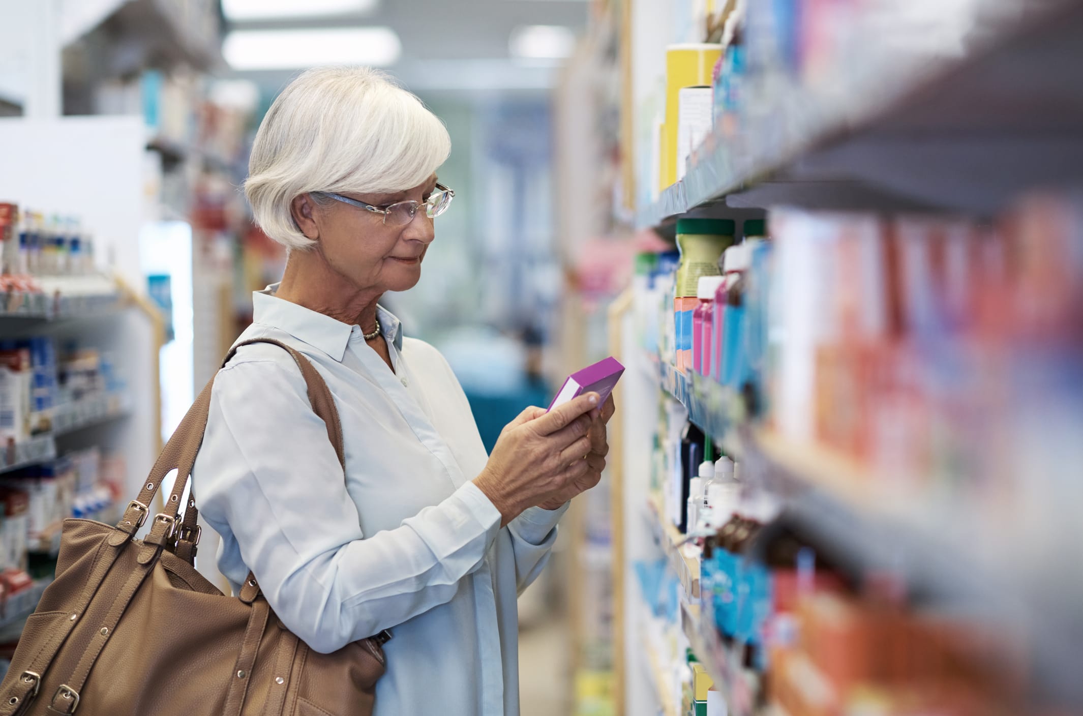 Woman shopping for over-the-counter drugs