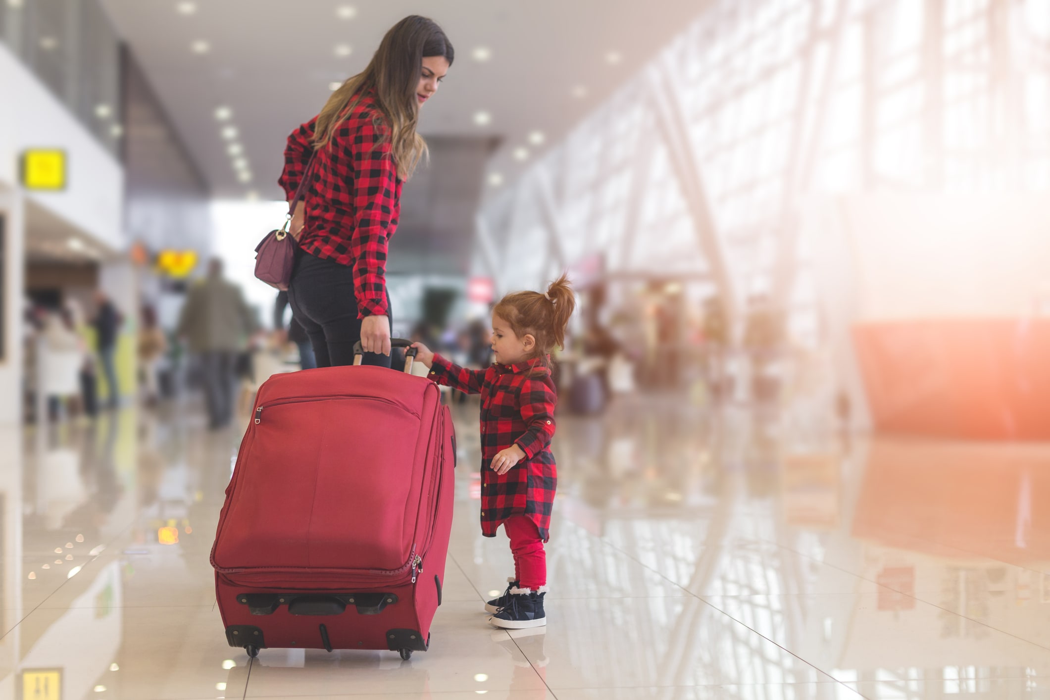 woman and child at airport
