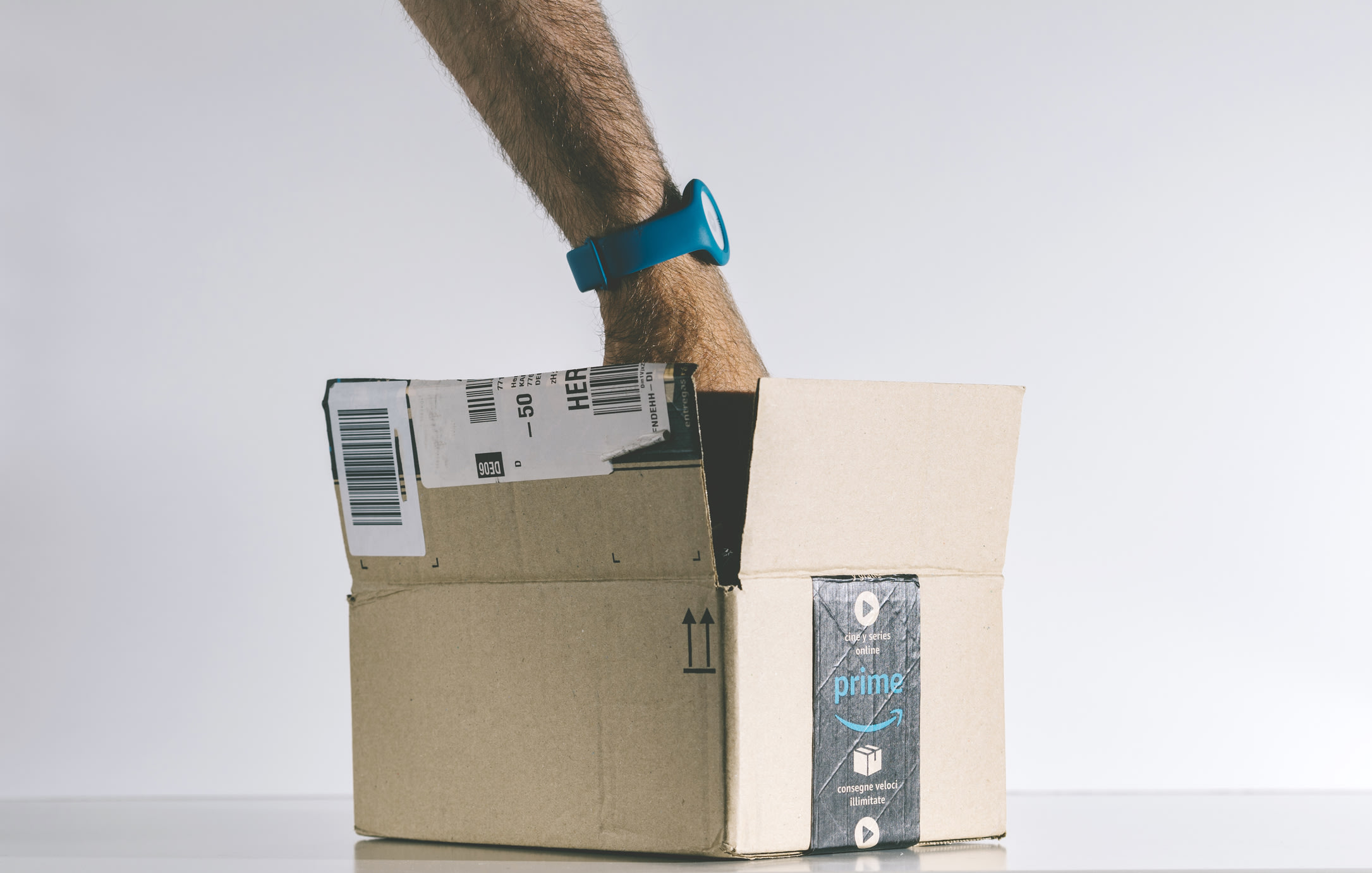 reaching into Amazon Prime box