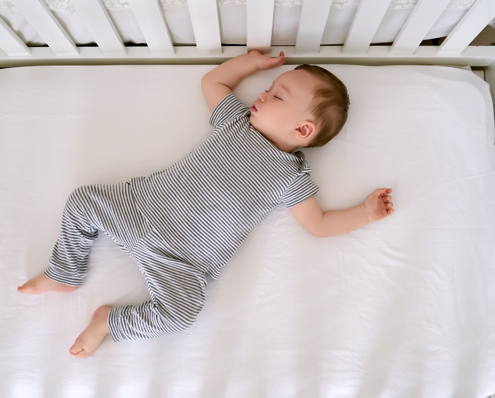 baby sleeps on mattress